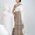 Off white cotton saree with intricate striped border and tassels