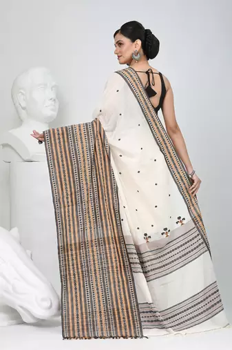 Off white cotton saree with intricate striped border and tassels