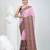 Dusky pink cotton saree with intricate striped border and tassels