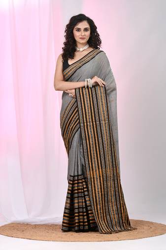 Grey cotton saree with intricate striped border and tassels