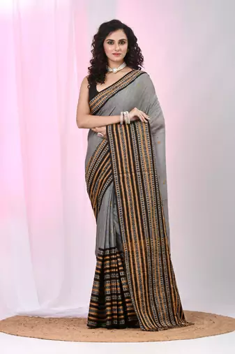 Grey cotton saree with intricate striped border and tassels
