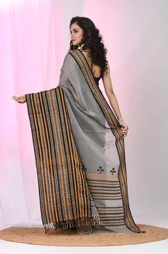 Grey cotton saree with intricate striped border and tassels