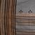 Grey cotton saree with intricate striped border and tassels