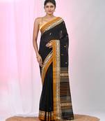 Black cotton saree with contrasting yellow border and tassels