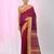 Magenta cotton saree with contrasting yellow border and tassels