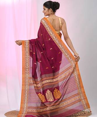 Magenta cotton saree with contrasting yellow border and tassels 3