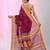 Magenta cotton saree with contrasting yellow border and tassels