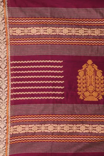 Magenta cotton saree with contrasting yellow border and tassels