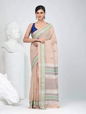 Elegant beige cotton saree with intricate border design 1