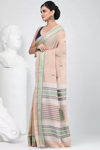 Elegant beige cotton saree with intricate border design