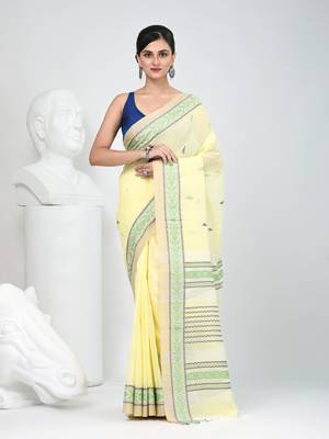Elegant yellow cotton saree with intricate border design 1