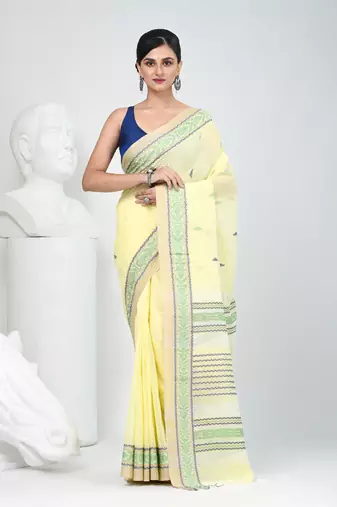 Elegant yellow cotton saree with intricate border design