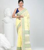 Elegant yellow cotton saree with intricate border design