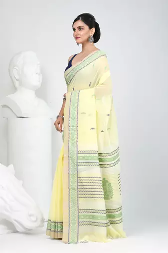 Elegant yellow cotton saree with intricate border design