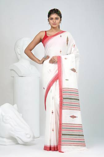 Elegant off white cotton saree with red border & woven motifs