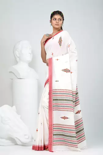 Elegant off white cotton saree with red border & woven motifs