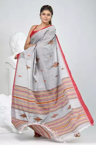 Elegant grey cotton saree with red border & woven motifs