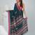 Elegant teal cotton saree with red border & woven motifs