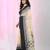 Beige and black cotton saree with traditional woven border