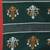 Green handwoven cotton saree with red border and traditional motifs