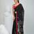 Black handwoven cotton saree with red border and traditional motifs