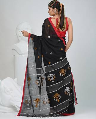 Black handwoven cotton saree with red border and traditional motifs 3