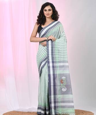White & black striped cotton saree with green accents and stripe pattern 1