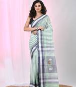 White & black striped cotton saree with green accents and stripe pattern