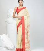 Beige cotton saree with red border & woven leaf motifs
