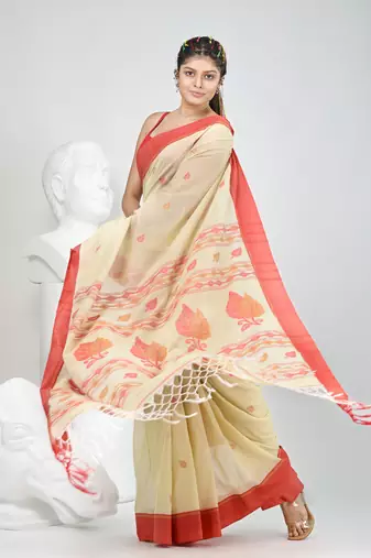 Beige cotton saree with red border & woven leaf motifs
