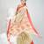Beige cotton saree with red border & woven leaf motifs