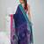 Navy blue cotton saree with pink and teal border & leaf design
