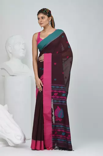 Brown cotton saree with pink and teal border & leaf design