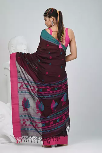 Brown cotton saree with pink and teal border & leaf design