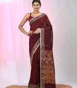 Maroon cotton saree with beige border and traditional woven pallu