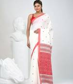 Elegant white cotton saree with red and green diamond motifs