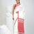 Elegant white cotton saree with red and green diamond motifs