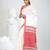 Elegant white cotton saree with red and green diamond motifs