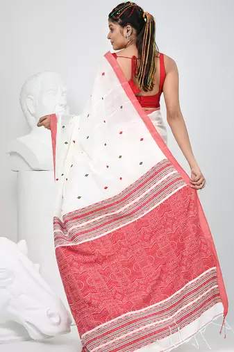 Elegant white cotton saree with red and green diamond motifs