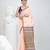 Elegant peach cotton saree with brown and black diamond motifs