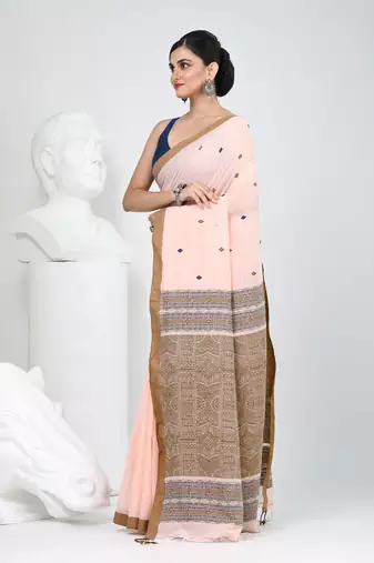 Elegant peach cotton saree with brown and black diamond motifs