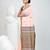 Elegant peach cotton saree with brown and black diamond motifs