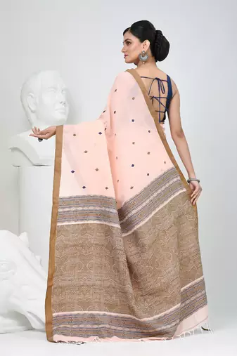 Elegant peach cotton saree with brown and black diamond motifs