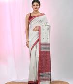 Elegant ecru cotton saree with red and green diamond motifs