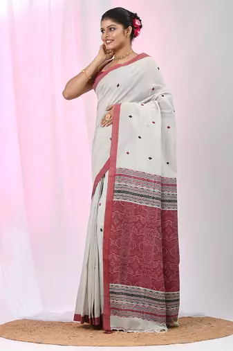 Elegant ecru cotton saree with red and green diamond motifs