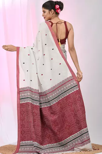 Elegant ecru cotton saree with red and green diamond motifs