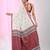 Elegant ecru cotton saree with red and green diamond motifs