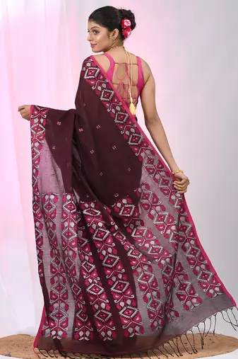 Elegant maroon cotton saree with geometric floral borders