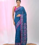 Elegant sapphire blue cotton saree with geometric floral borders