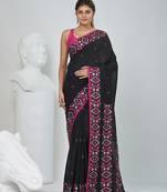 Elegant black cotton saree with geometric floral borders